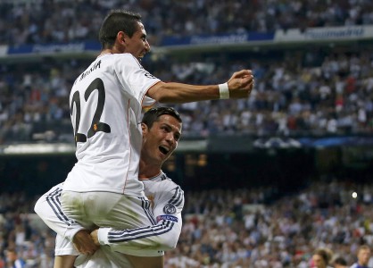 Real Madrid's Ronaldo celebrates his goal against FC Copenhagen with team-mate Di Maria during their Champions League soccer match in Madrid