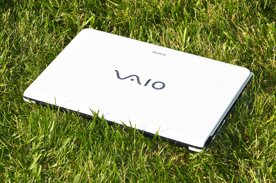 White Sony Vaio laptop on the green grass. 15.07.2015 Istanbul Maltepe park
