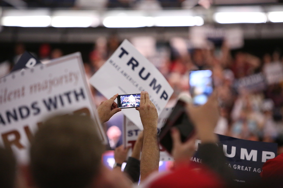 ANAHEIM CALIFORNIA, May 25, 2016: Thousands of Supporters and Fans wave signs and take cell phone pictures of Republican Nominee Presidential candidate Donald Trump as he speaks at his campaign event