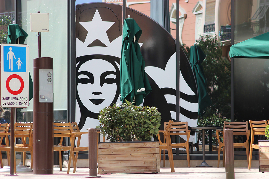 Monte-Carlo Monaco - March 9 2016: Starbucks Sign is Displayed at the Facade of a Starbucks Store. Starbucks Corporation is an American Coffee Company and the Largest Coffeehouse Company in the world with 23450 Stores in 67 Countries